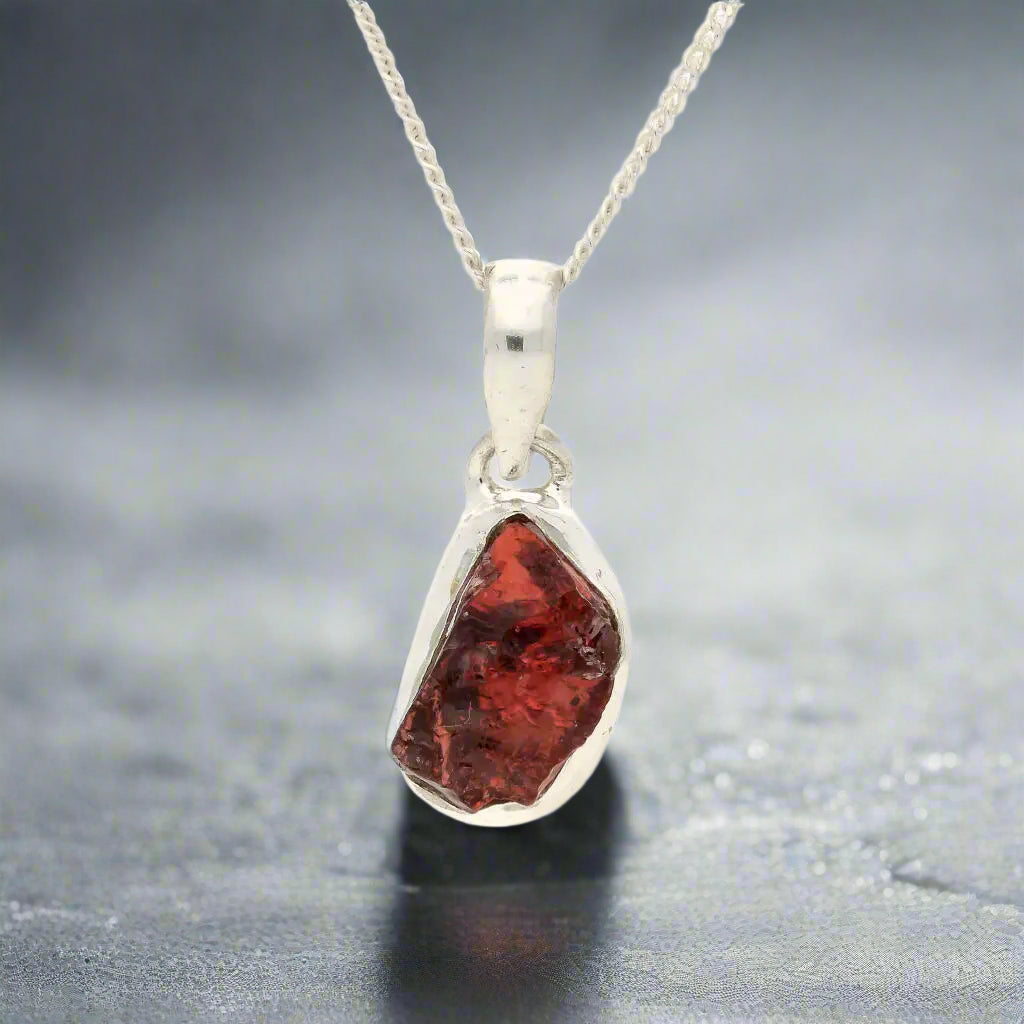 Buy your Grounded Passion – Rough Garnet Silver Pendant online now or in store at Forever Gems in Franschhoek, South Africa