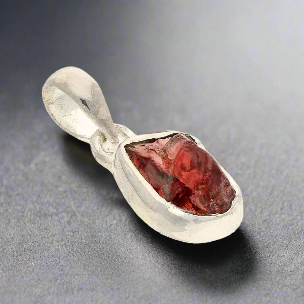 Buy your Grounded Passion – Rough Garnet Silver Pendant online now or in store at Forever Gems in Franschhoek, South Africa