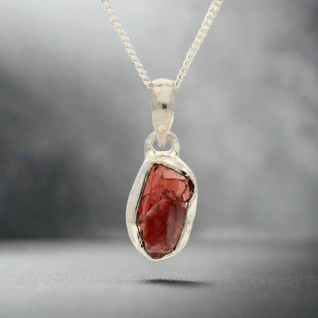 Buy your Grounded Passion – Rough Garnet Silver Pendant online now or in store at Forever Gems in Franschhoek, South Africa