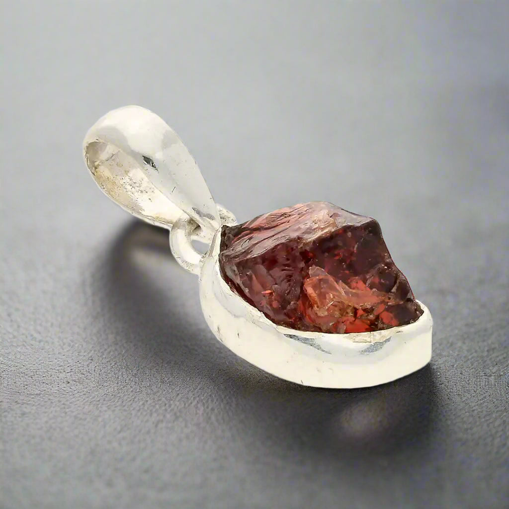 Buy your Grounded Passion – Rough Garnet Silver Pendant online now or in store at Forever Gems in Franschhoek, South Africa