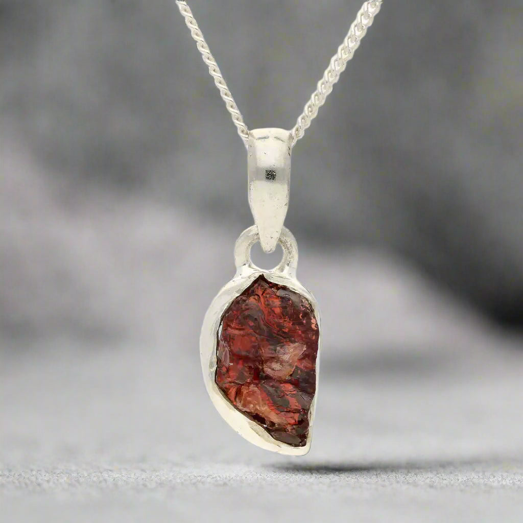 Buy your Grounded Passion – Rough Garnet Silver Pendant online now or in store at Forever Gems in Franschhoek, South Africa