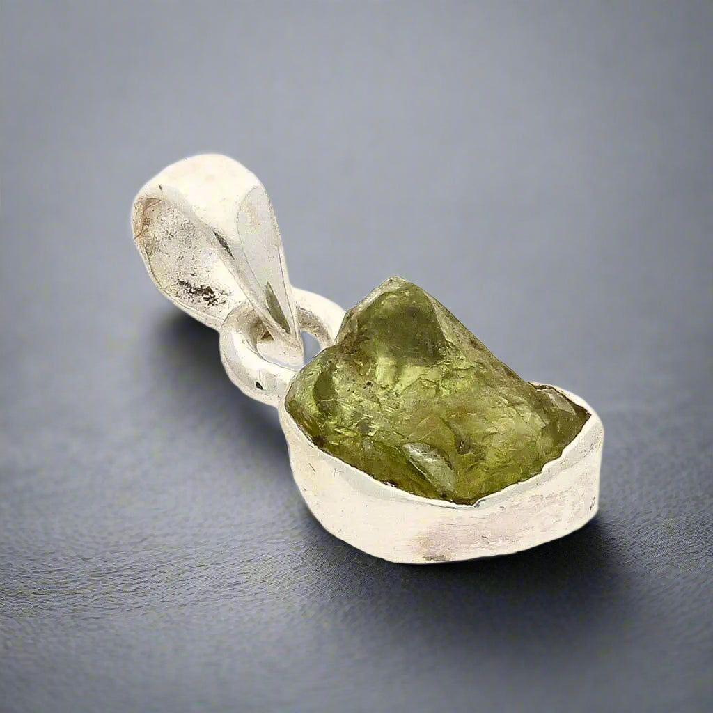 Buy your Fresh Start – Rough Peridot Silver Pendant online now or in store at Forever Gems in Franschhoek, South Africa