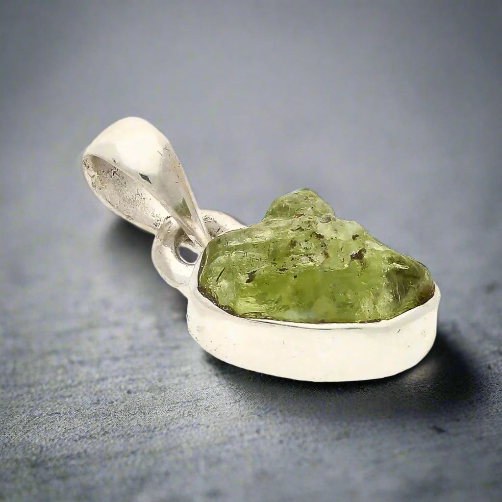 Buy your Fresh Start – Rough Peridot Silver Pendant online now or in store at Forever Gems in Franschhoek, South Africa