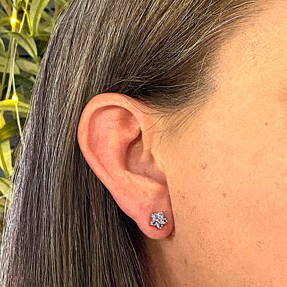Get your Eternal Blossom: Handcrafted Silver Earrings with Tanzanite Gems online now or in store at Forever Gems in Franschhoek, South Africa