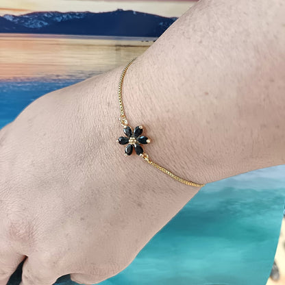 Get your Midnight Bloom Black Flower Gold Plated Bracelet online now or in store at Forever Gems in Franschhoek, South Africa