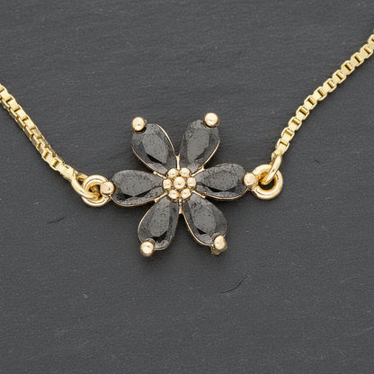 Get your Midnight Bloom Black Flower Gold Plated Bracelet online now or in store at Forever Gems in Franschhoek, South Africa