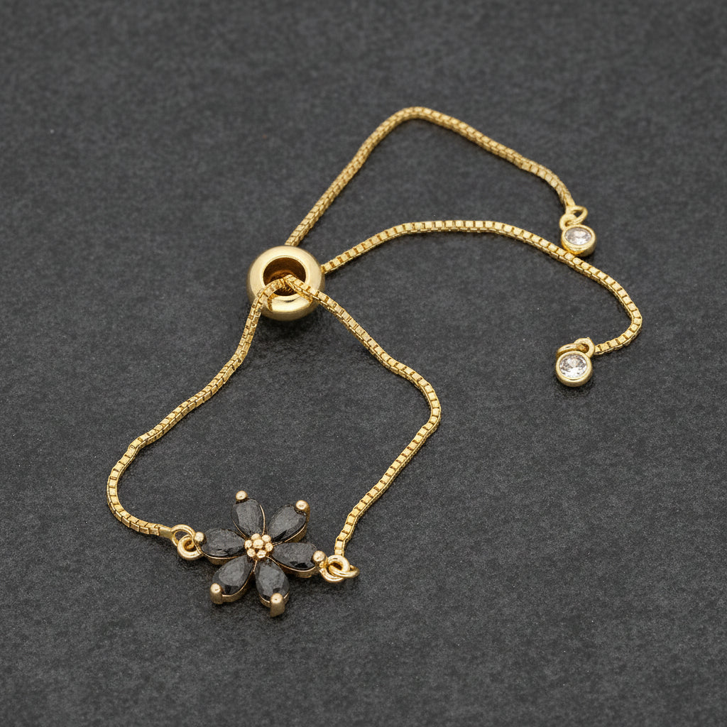 Get your Midnight Bloom Black Flower Gold Plated Bracelet online now or in store at Forever Gems in Franschhoek, South Africa