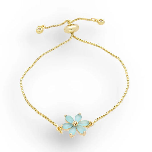 Get your Ocean Bloom Blue Flower Gold Plated Bracelet online now or in store at Forever Gems in Franschhoek, South Africa