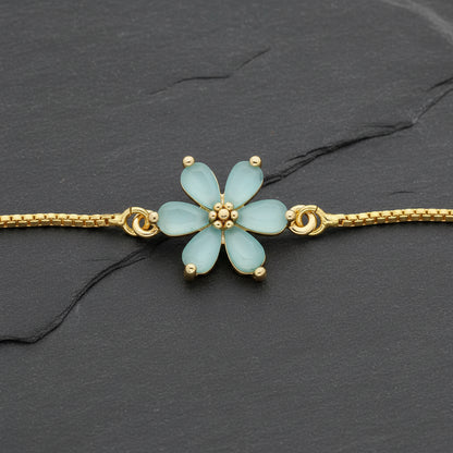 Get your Ocean Bloom Blue Flower Gold Plated Bracelet online now or in store at Forever Gems in Franschhoek, South Africa