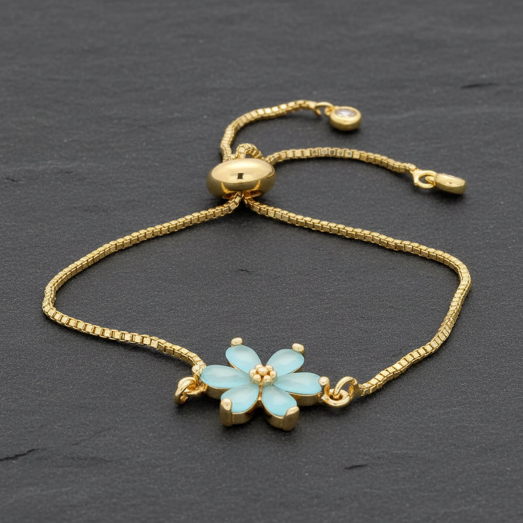 Get your Ocean Bloom Blue Flower Gold Plated Bracelet online now or in store at Forever Gems in Franschhoek, South Africa