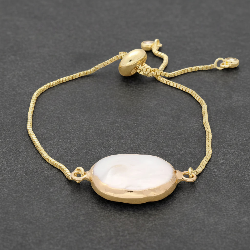 Get your Moonlight Glow Coin Pearl Gold Plated Bracelet online now or in store at Forever Gems in Franschhoek, South Africa