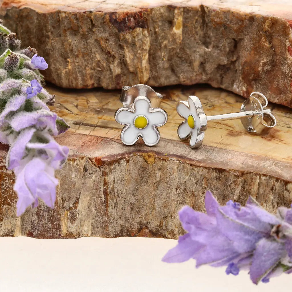 Get your Sterling Silver White Enamel Daisy Flower Stud Earrings 7mm online now or in store at Forever Gems in Franschhoek, South Africa