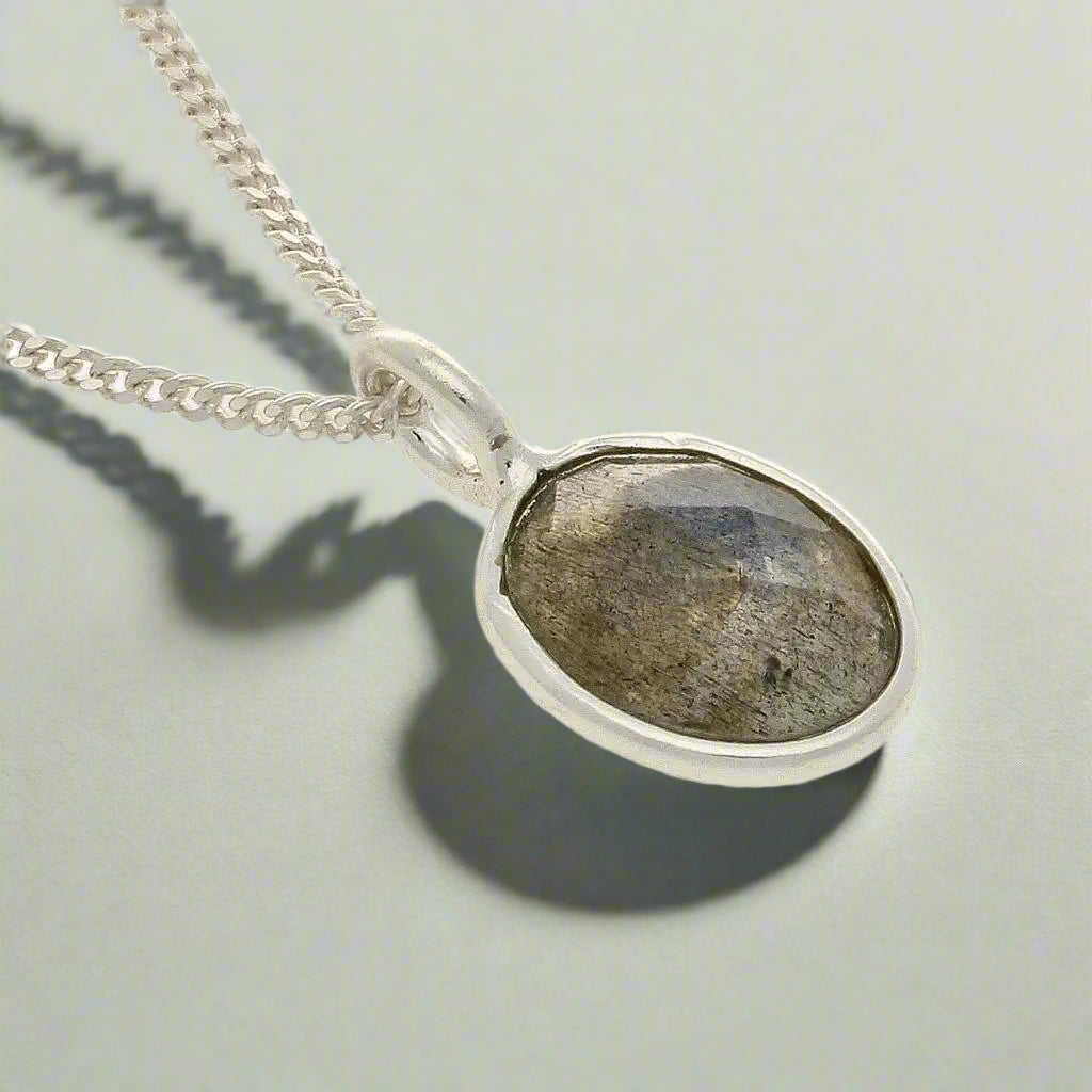 Buy your Mystic Oval - Faceted Oval Labradorite Necklace online now or in store at Forever Gems in Franschhoek, South Africa
