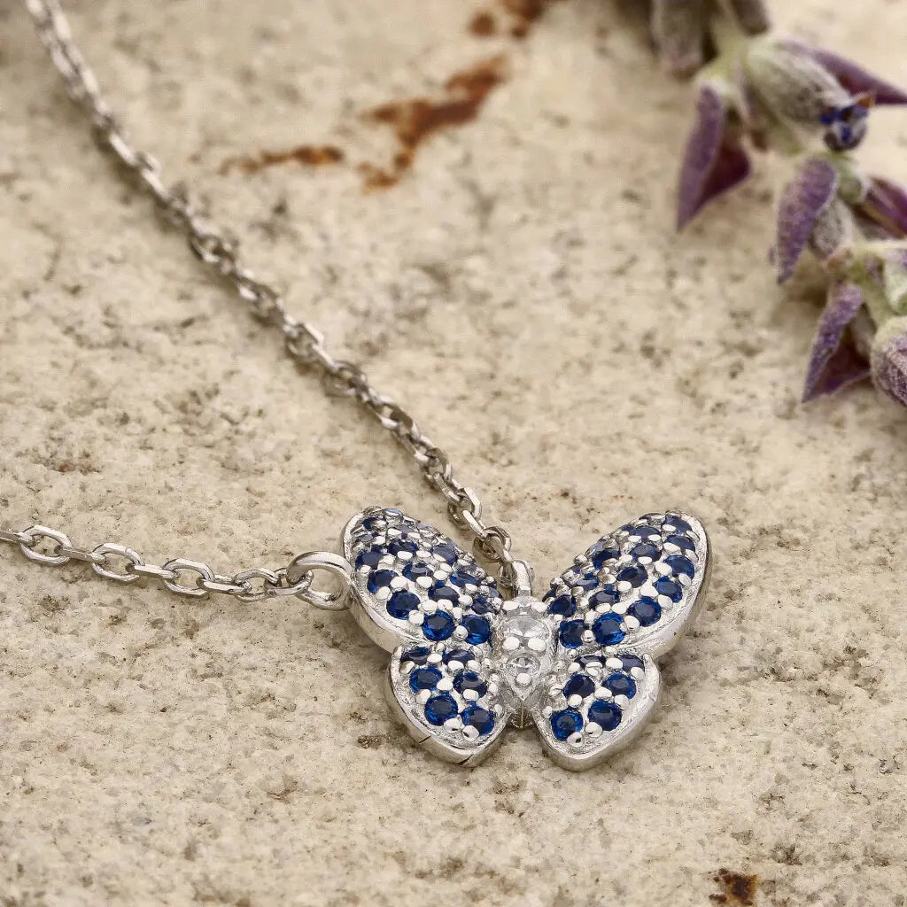 Get your Delicate Sterling Silver Butterfly Necklace with Brilliant Blue CZ Stones online now or in store at Forever Gems in Franschhoek, South Africa