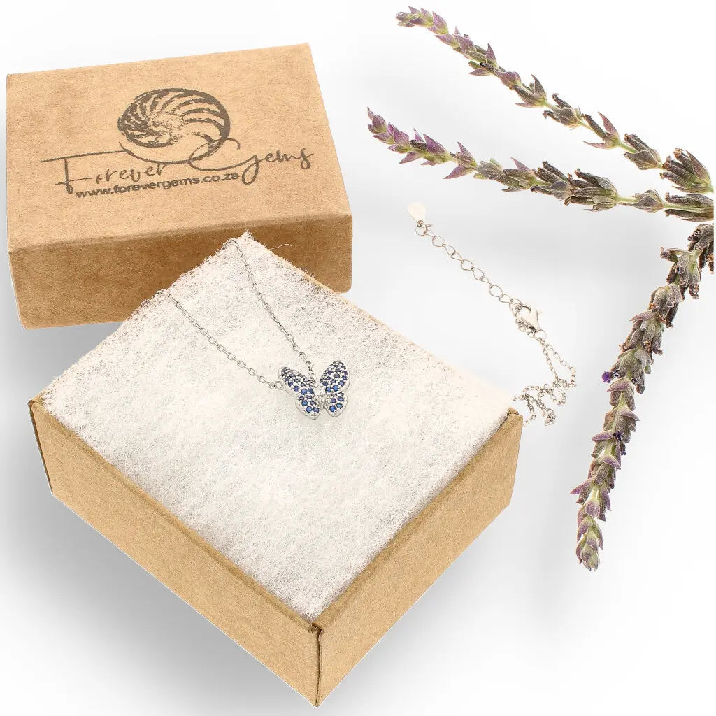 Get your Delicate Sterling Silver Butterfly Necklace with Brilliant Blue CZ Stones online now or in store at Forever Gems in Franschhoek, South Africa