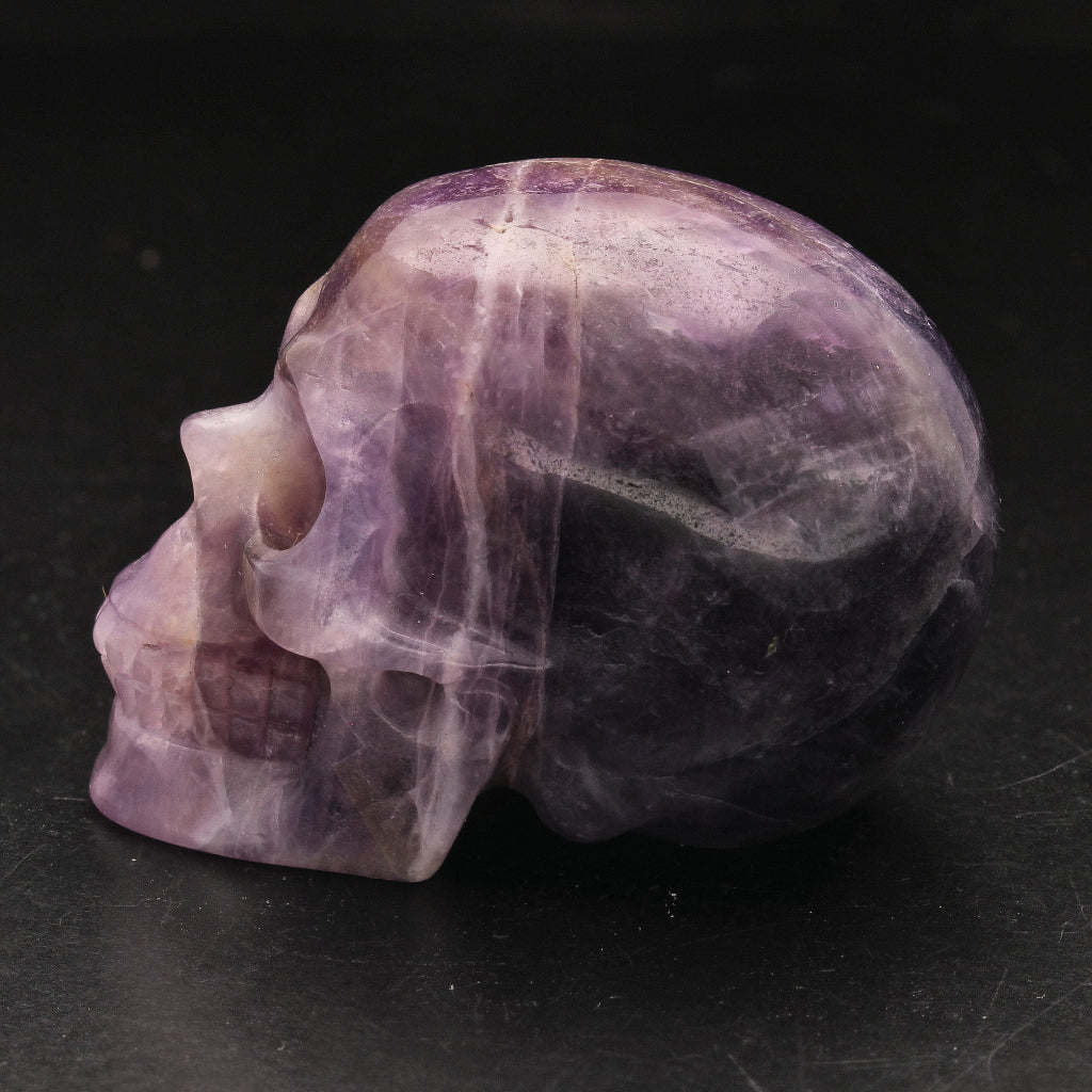 Buy your Guardian Spirit Purple Amethyst Carved Skull online now or in store at Forever Gems in Franschhoek, South Africa