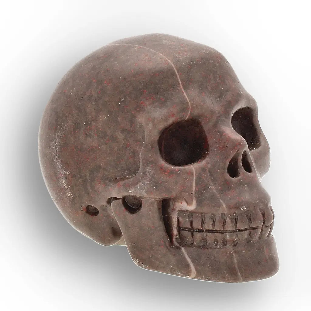 Get your Plum Jasper Skull Carving – Grounding Strength & Vitality Crystal online now or in store at Forever Gems in Franschhoek, South Africa