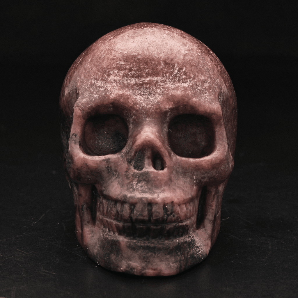 Buy your Pink Guardian Rhodonite Crystal Skull online now or in store at Forever Gems in Franschhoek, South Africa