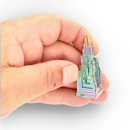 Get your Cosmic Bismuth Formation – Iridescent Geometric Crystal online now or in store at Forever Gems in Franschhoek, South Africa