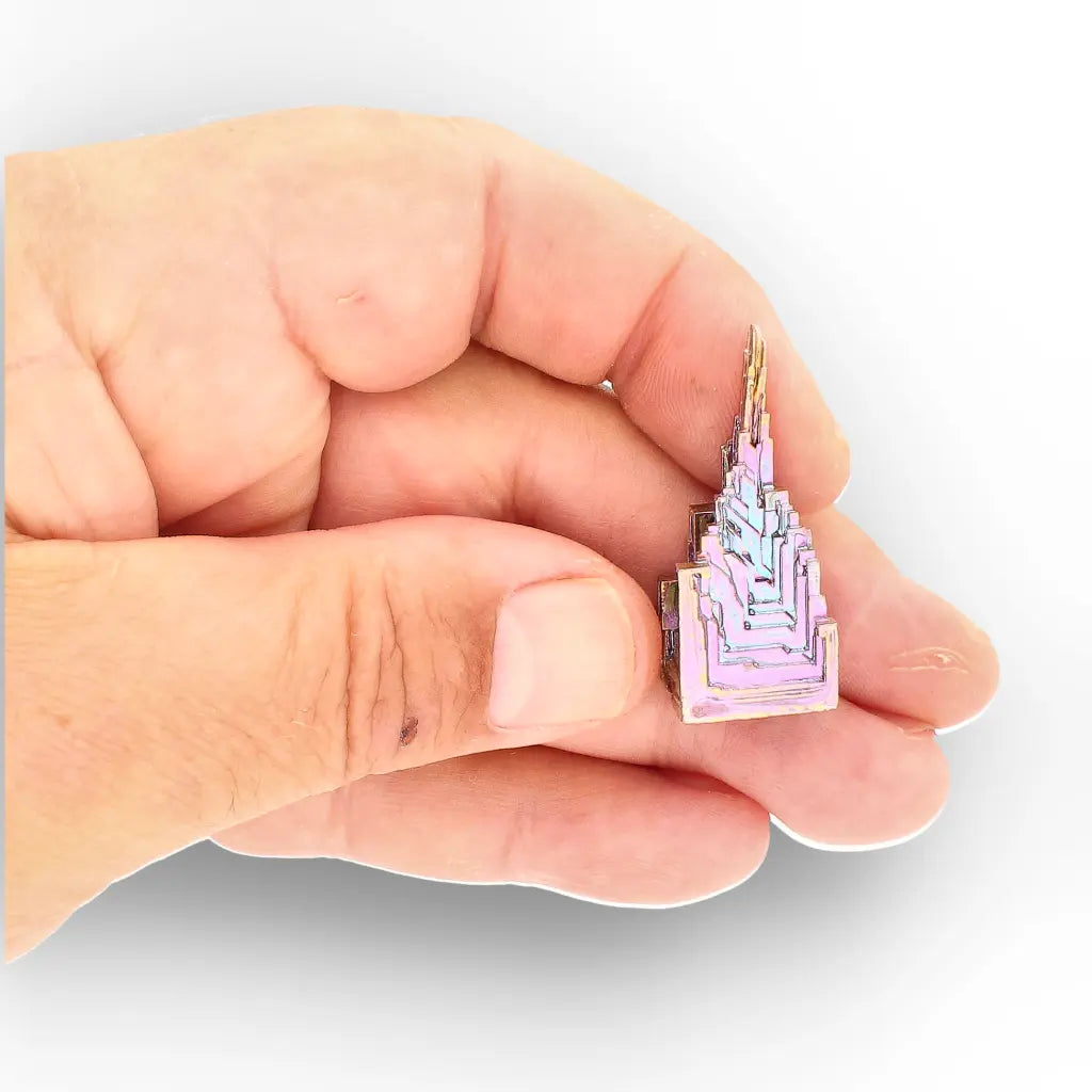 Get your Bismuth Crystal Cluster – Iridescent Metallic Geometric Specimen online now or in store at Forever Gems in Franschhoek, South Africa