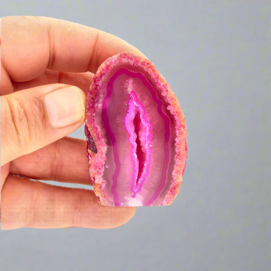 Get your Agate Crystal Cave - Pink Dyed Polished Flat Base Geode online now or in store at Forever Gems in Franschhoek, South Africa