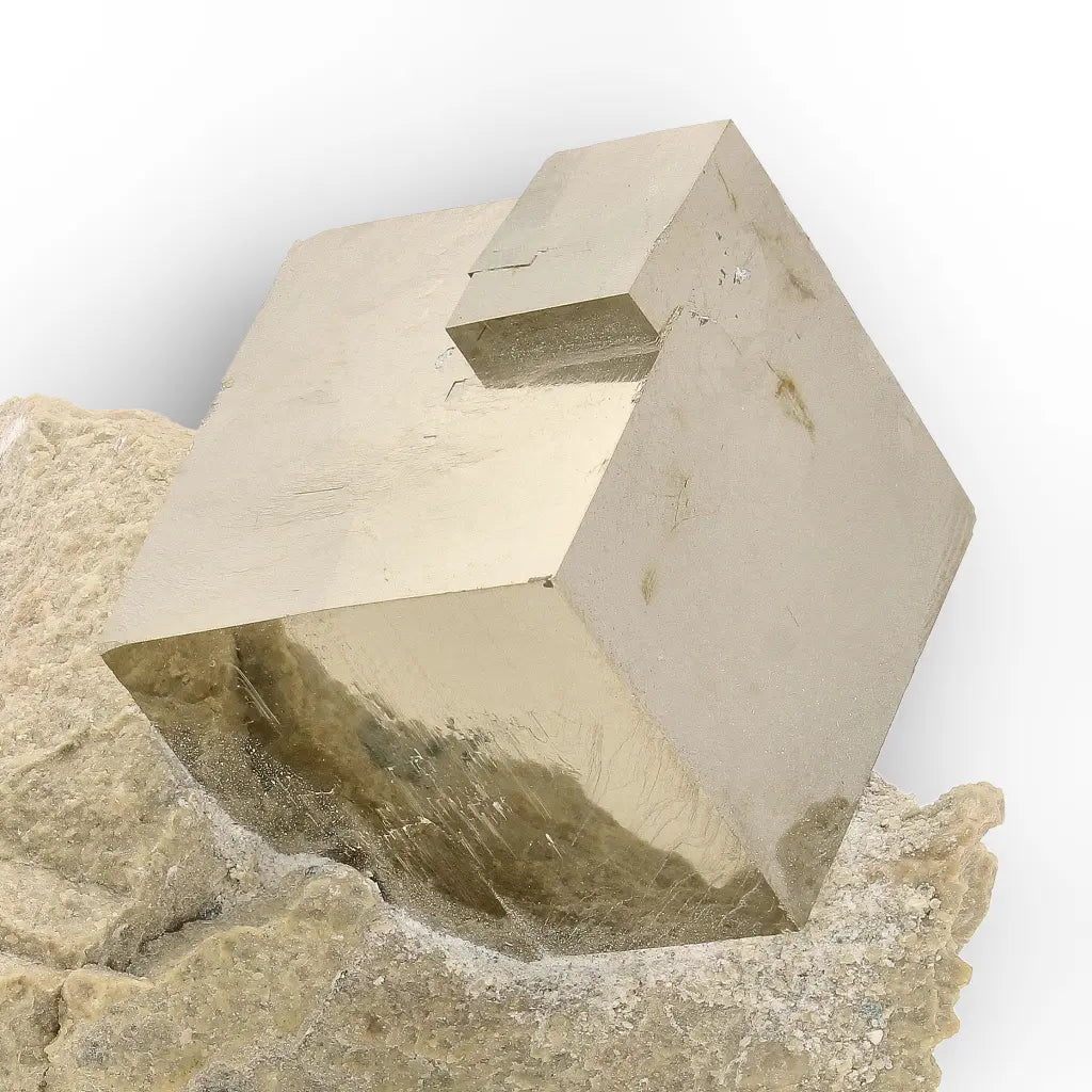 Get your Pyrite Cube in Matrix – Mirror-Finish Navajún Twin Formation online now or in store at Forever Gems in Franschhoek, South Africa