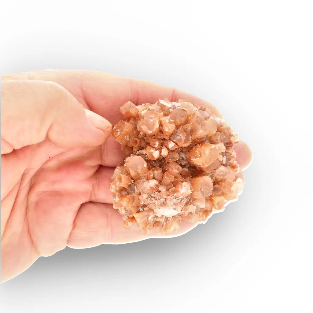 Get your Large Aragonite Star Cluster with Peach Crystal Growth online now or in store at Forever Gems in Franschhoek, South Africa