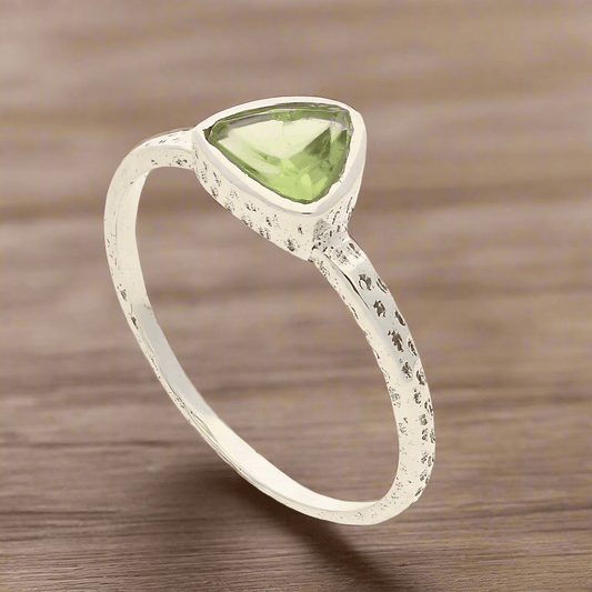 Get your Peridot Radiance: Trillion Spark Sterling Silver Ring online now or in store at Forever Gems in Franschhoek, South Africa