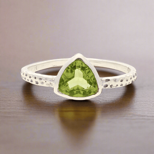 Get your Peridot Radiance: Trillion Spark Sterling Silver Ring online now or in store at Forever Gems in Franschhoek, South Africa
