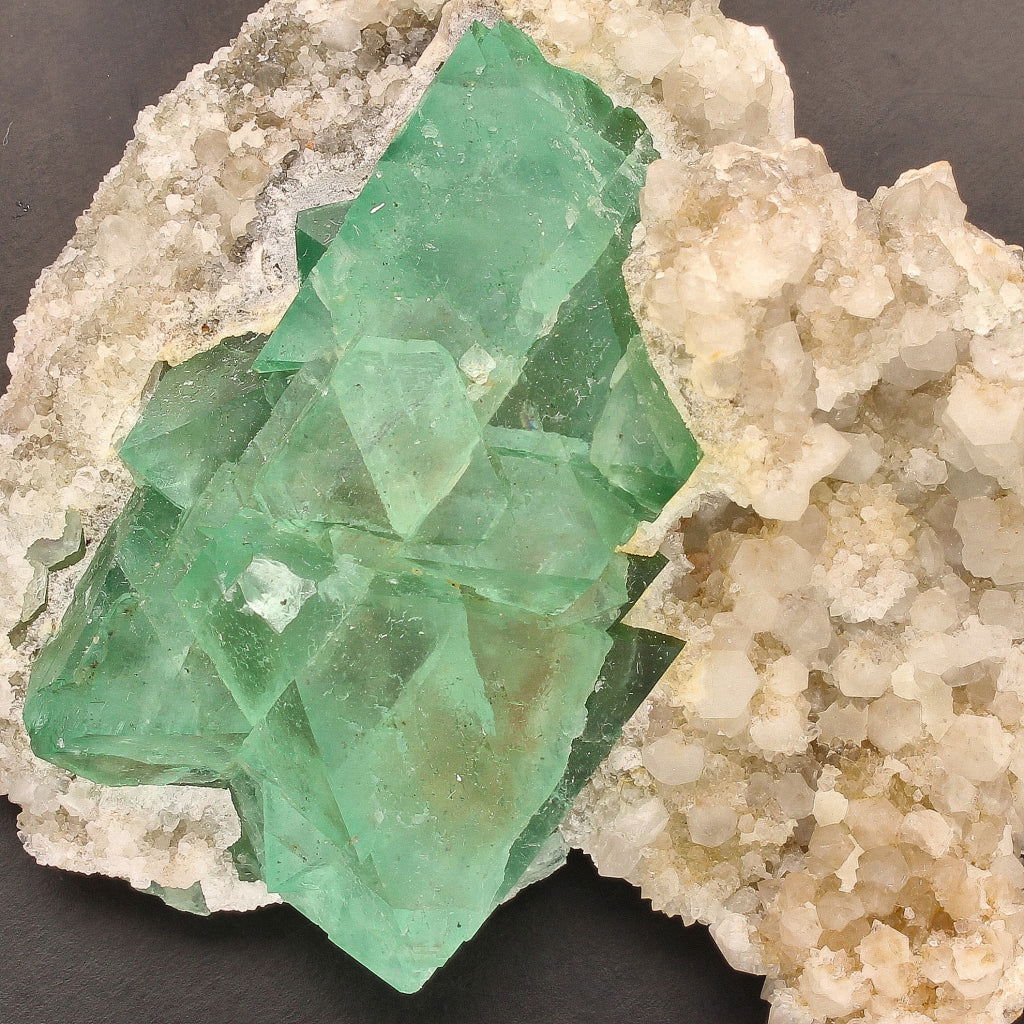 Buy your Fluorite Octahedra on Quartz (Riemvasmaak) online now or in store at Forever Gems in Franschhoek, South Africa