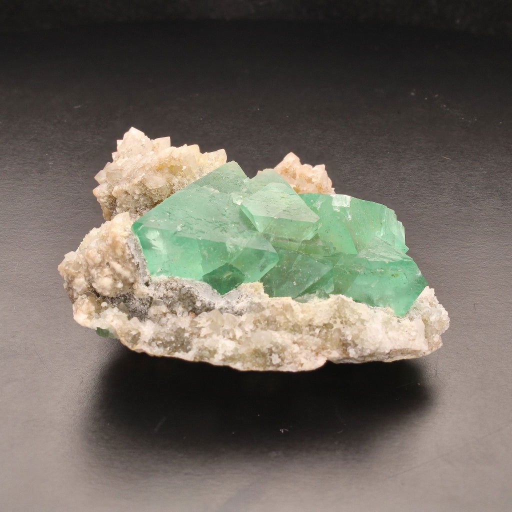 Buy your Fluorite Octahedra on Quartz (Riemvasmaak) online now or in store at Forever Gems in Franschhoek, South Africa
