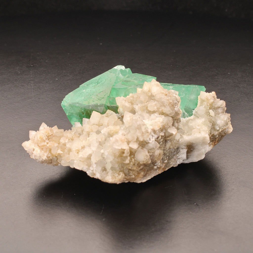 Buy your Fluorite Octahedra on Quartz (Riemvasmaak) online now or in store at Forever Gems in Franschhoek, South Africa