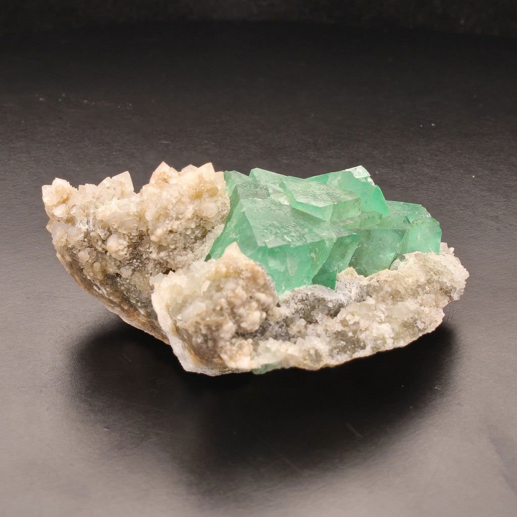 Buy your Fluorite Octahedra on Quartz (Riemvasmaak) online now or in store at Forever Gems in Franschhoek, South Africa