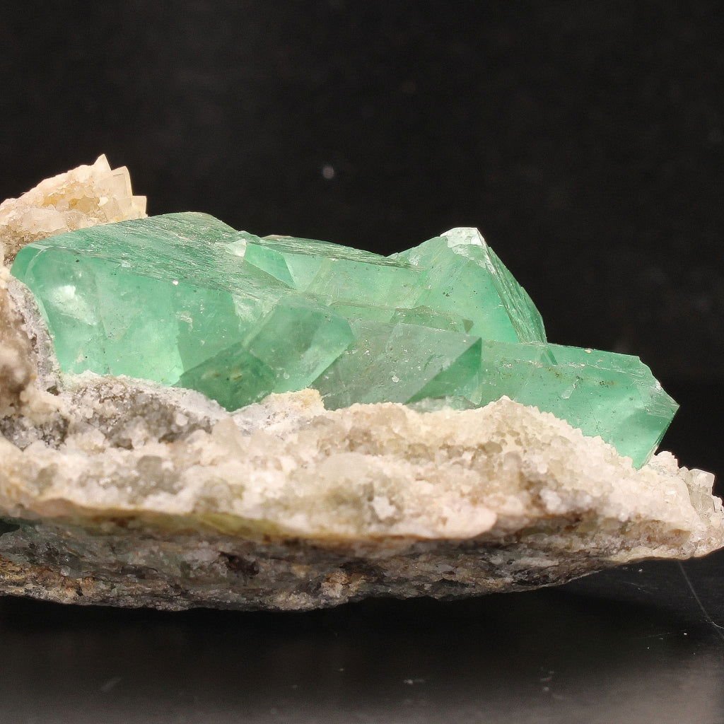 Buy your Fluorite Octahedra on Quartz (Riemvasmaak) online now or in store at Forever Gems in Franschhoek, South Africa
