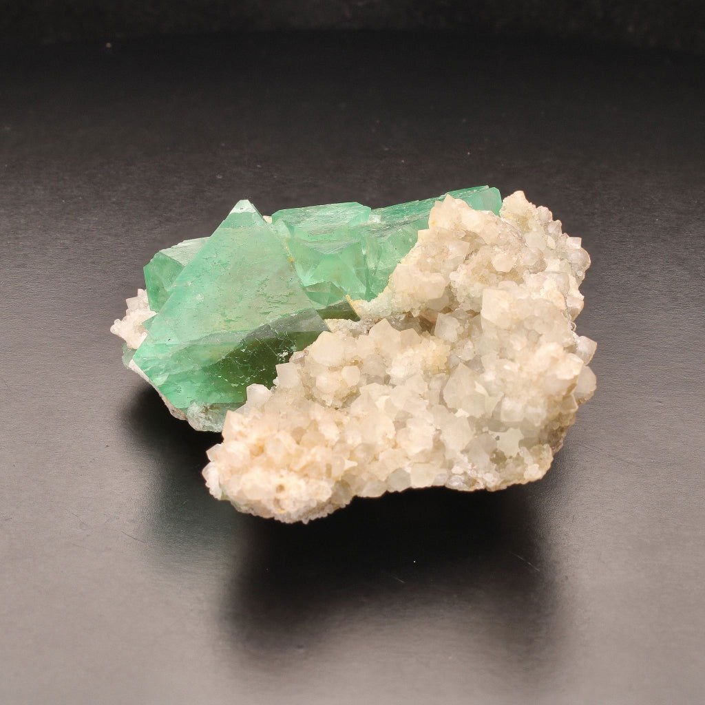 Buy your Fluorite Octahedra on Quartz (Riemvasmaak) online now or in store at Forever Gems in Franschhoek, South Africa