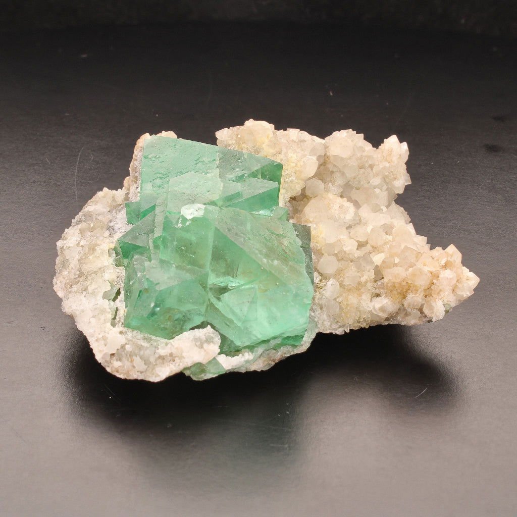 Buy your Fluorite Octahedra on Quartz (Riemvasmaak) online now or in store at Forever Gems in Franschhoek, South Africa