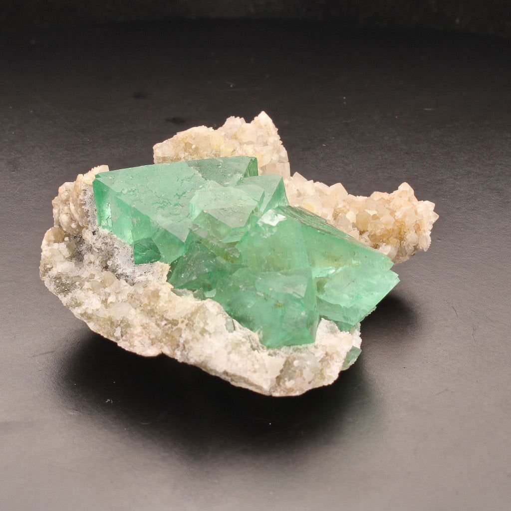 Buy your Fluorite Octahedra on Quartz (Riemvasmaak) online now or in store at Forever Gems in Franschhoek, South Africa