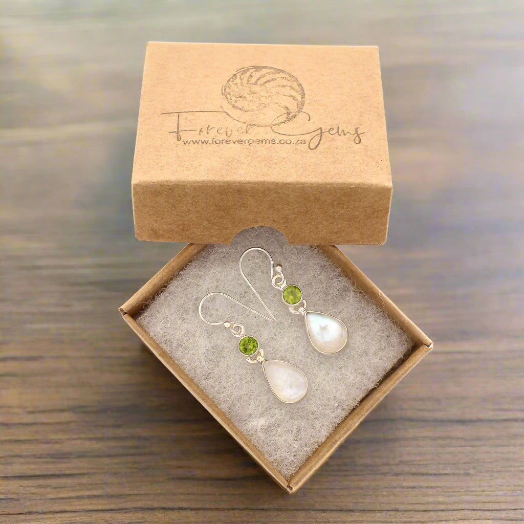 Buy your Twinkle and Shine: Rainbow Moonstone & PeridoyEarrings online now or in store at Forever Gems in Franschhoek, South Africa