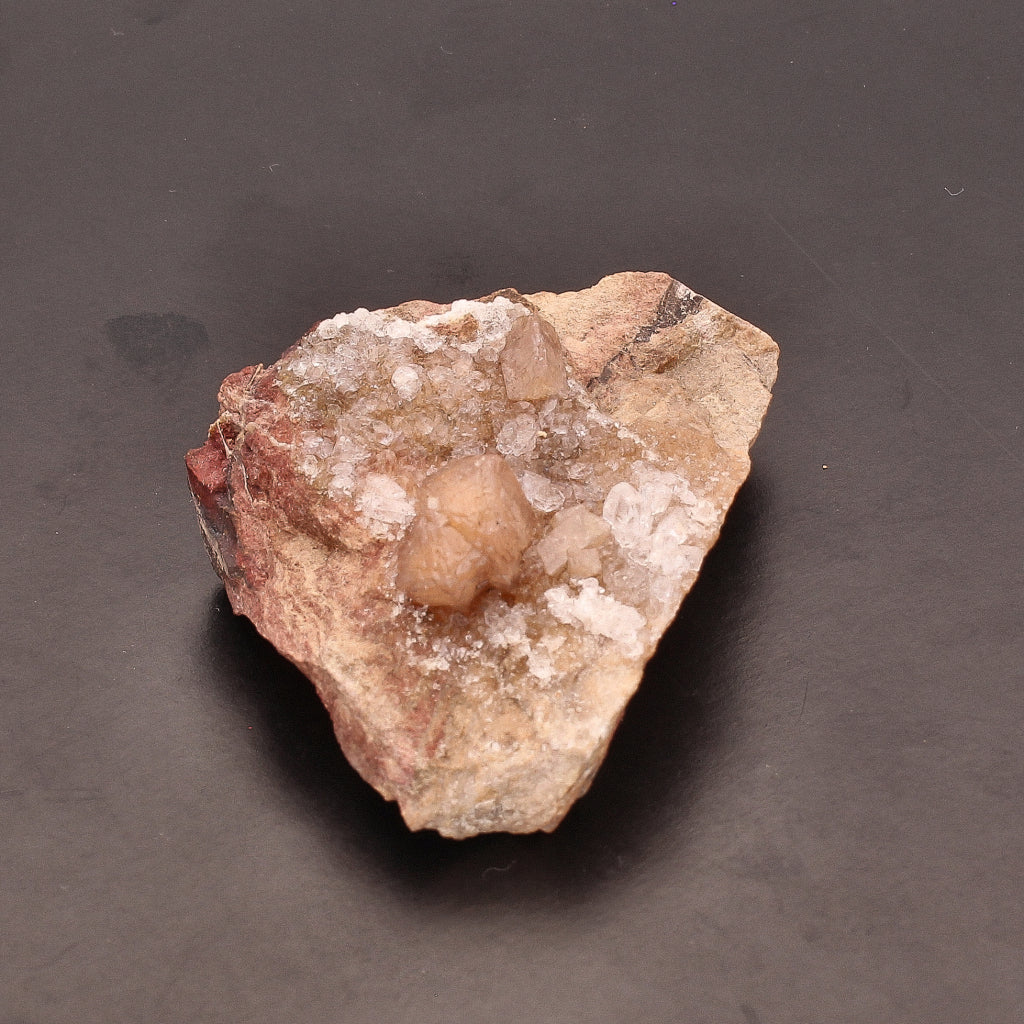 Buy your Olmiite Small Crystal with Calcite on Matrix online now or in store at Forever Gems in Franschhoek, South Africa